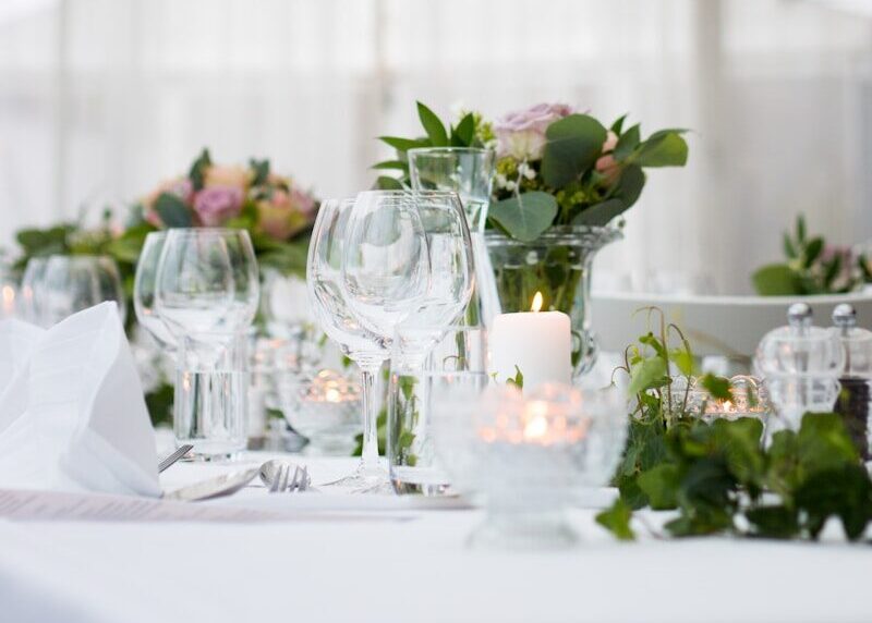 clear long-stem wine glasses on table